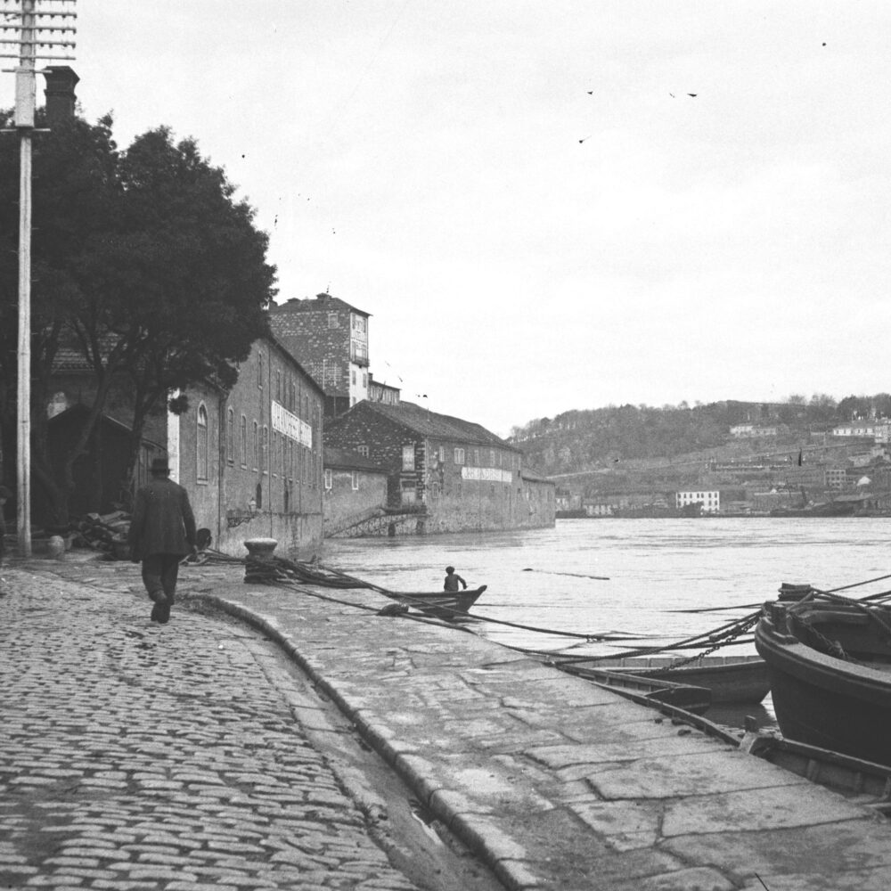 man walking by the river in porto