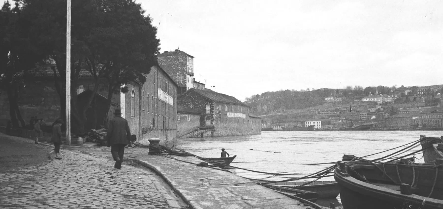 man walking by the river in porto