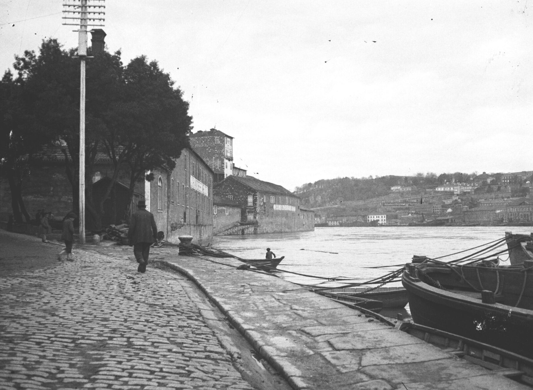man walking by the river in porto