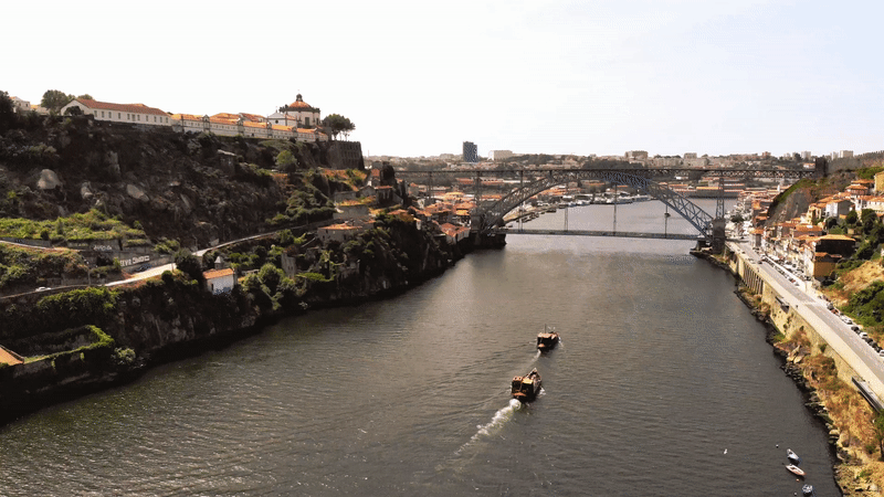 two boats on the river in porto