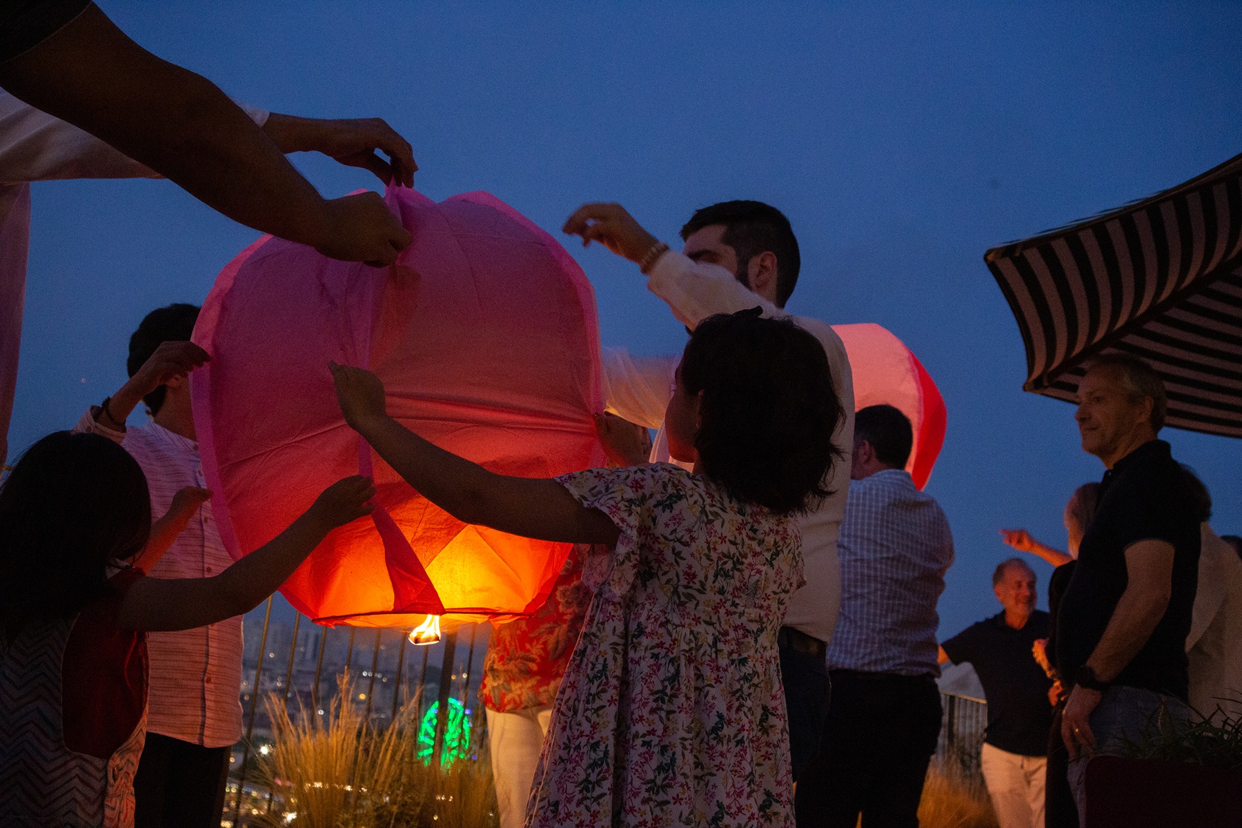 São João balloon launching in a Porto rooftop
