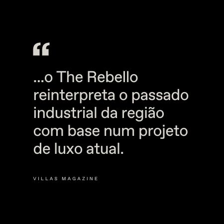 Sobre um fundo preto, texto branco em português: "...o The Rebello reinterpreta o passado industrial da região com base num projeto de luxo atual." Na parte inferior, está escrito: "Revista Villas".