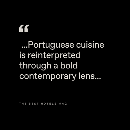 A black background with white text that reads: "...Portuguese cuisine is reinterpreted through a bold contemporary lens..." Below, it says "THE BEST HOTELS MAG" in smaller letters.